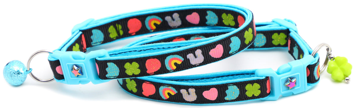 Colorful cat collars, leashes, and harnesses in various sizes including camo designs